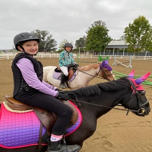 A professional rider on a horse